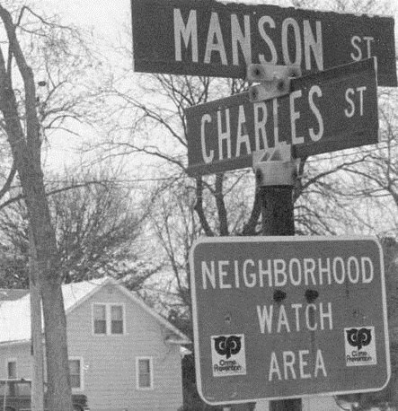 Funny street signs - Charles St intersects with Manson St